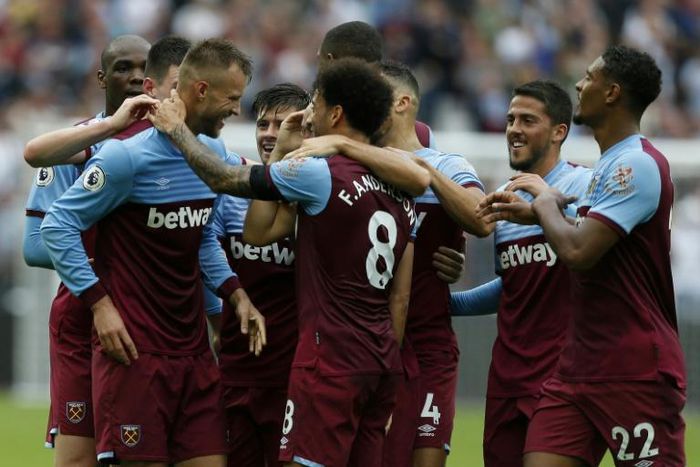 West Ham United forward Andriy Yarmolenko (left) celebrates after scoring against Manchester United