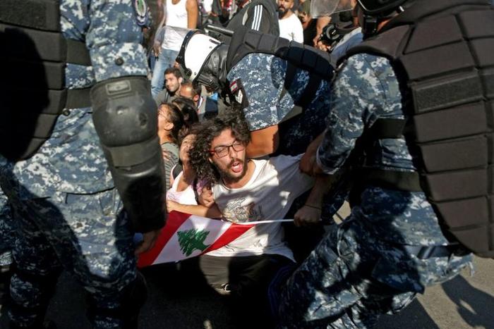 The tug-of-war between demonstrators seeking to block roads and security forces under orders to reopen the country for business has repeated itself acrss Lebanon