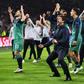 Time to go again: Tottenham players manager Mauricio Pochettino (centre) celebrated a famous Champions League semi-final win at Ajax in May