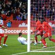 Alphonso Davies (12) celebrates firing Canada into the lead in their upset victory over the United States