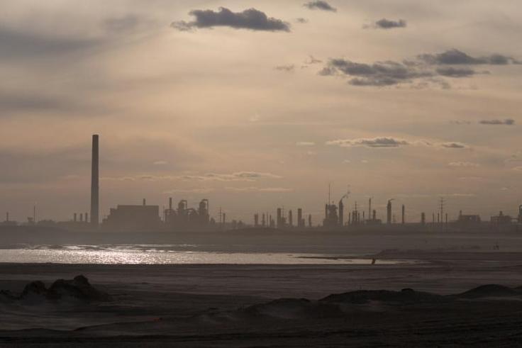 The future of Canadian petroleum facilties like this one in Alberta, with both the jobs and pollution they produce, is at stake in the national elections