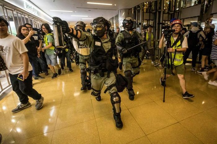 Beijing warned after a four-day meeting of Communist Party leaders that it would not tolerate any challenges to its authority over Hong Kong