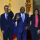 Venezuelan Foreign Minister Jorge Arreaza, Education Minister Aristobulo Isturiz, Vice President Delcy Rodriguez and opposition member Javier Bertucci pose after signing a dialogue agreement between the government and the opposition in Caracas