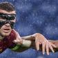 AS Roma's Edin Dzeko wore a protective face mask after breaking his cheekbone.