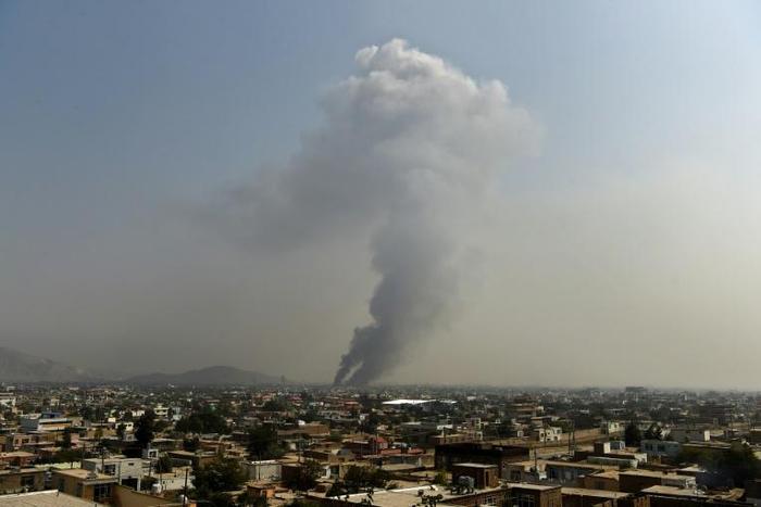 Smoke rises from the site of a September 3 attack in Kabul: US negotiations with the Taliban aim to reduce the level of violence in the country, but experts say they won't end the threat from groups lke Al-Qaeda and Islamic State