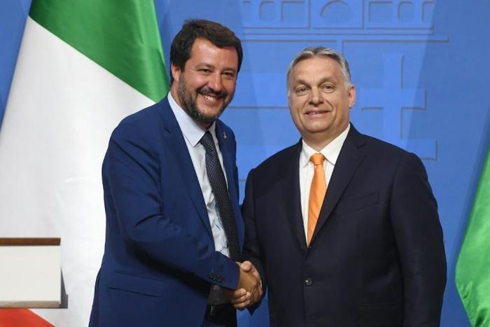 Close ties: Italy's Matteo Salvini and Hungarian Prime Minister Viktor Orban shake hands in Budapest in May