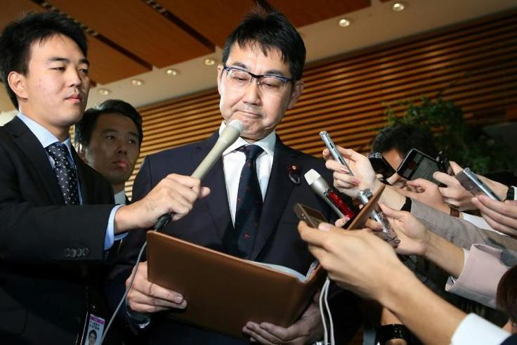 Japan's Justice Minister Katsuyuki Kawai speaks to journalists after submitting his resignation in Tokyo
