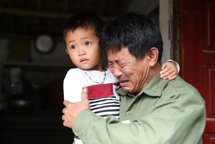 Le Minh Tuan fears his son Le Van Ha is among the 39 found dead in a truck in Britain and that his young grandson has been left fatherless