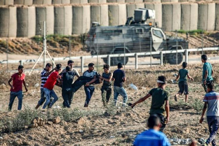 Two Palestinian teenagers and 46 other protesters were wounded during weekly demonstrations along the Gaza border on Friday