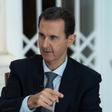 A handout picture released by the official Syrian Arab News Agency (SANA) on October 31, 2019 shows President Bashar al-Assad speaking during a special broadcast interview in Syria's capital Damascus