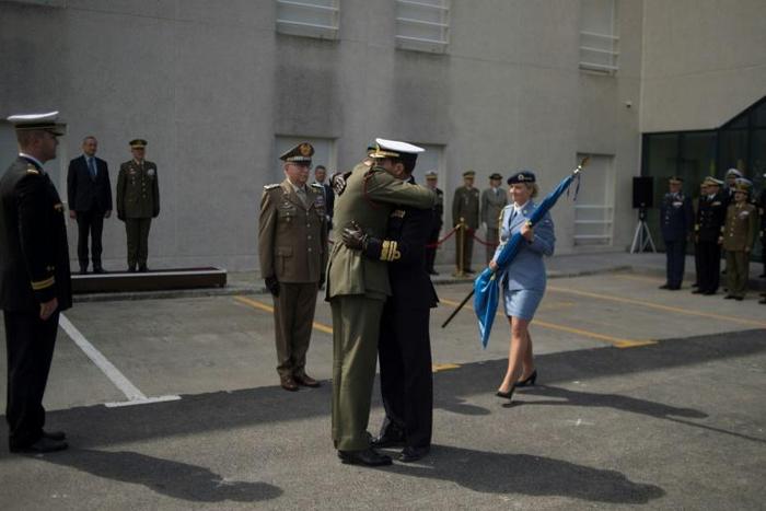 Having described the occasion as "a sad day for the UK," British Major General Charles Richard Stickland (left) embraced Spanish Vice Admiral Antonio Martorell during Friday's ceremony