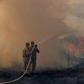 Firefighters in the Brazilian Amazon basin state of Mato Grosso battle a forest blaze in the municipality of Sorriso