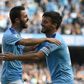 Manchester City's Bernardo Silva (L) celebrates with David Silva during their thrashing of Watford