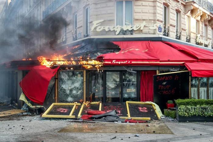 Dozens of businesses were burned and looted during "yellow vest" anti-government protests in Paris last Saturday.