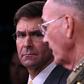 US Defense Secretary Mark Esper (left) listens to the Chairman of the Joint Chiefs of Staff General Joseph Dunford during a press conference at the Pentagon