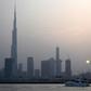 With the highest building in the world, Burj Khalifa (left), grand commercial centres and artificial islands, Dubai projects an image of prosperity