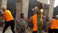 Wife flogs another woman she caught sleeping with husband, using her cloth as wrapper (video)