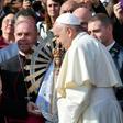 Britain's Bishop of the Forces Paul Mason, left, handed over a statuette of Our Lady of Lujan, Argentina's patron saint, to his Argentine counterpart, Santiago Olivera