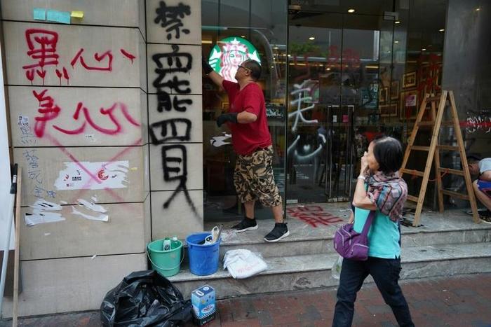Multiple Starbucks coffee shops in Hong Kong were vandalised over the weekend