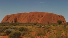 Uluru, formerly known as Ayers Rock, is a a large sandstone rock formation and the world's biggest monolith