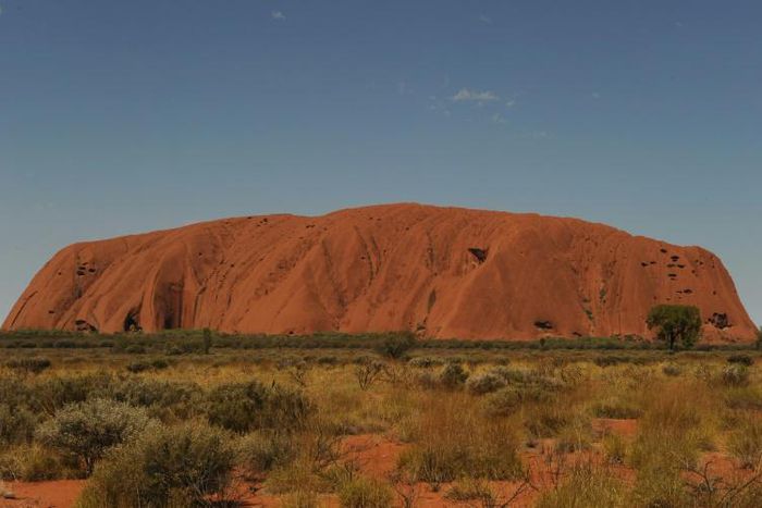 Uluru, formerly known as Ayers Rock, is a a large sandstone rock formation and the world's biggest monolith