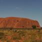Uluru, formerly known as Ayers Rock, is a a large sandstone rock formation and the world's biggest monolith