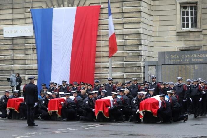 Three police officers and an administrative worker were killed in the October 3 knife attack