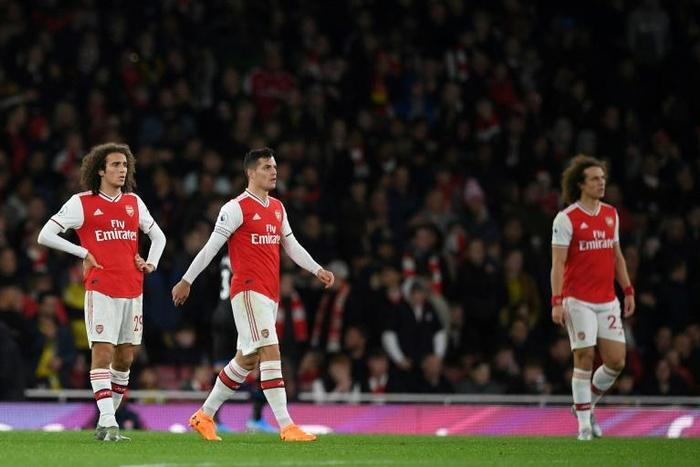 Granit Xhaka (C) is in hot water for swearing at Arsenal fans
