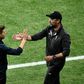 Liverpool manager Jurgen Klopp (right) and Tottenham Hotspur boss Mauricio Pochettino (left) have criticised the early closure to the Premier League transfer window