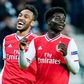 Arsenal striker Pierre-Emerick Aubameyang (L) and teenage forward Bukayo Saka celebrate after scoring scoring during the Europa League win at Eintracht Frankfurt on Thursday