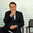 (FILES) In this file photo taken on September 06, 2019, Brazilian President Jair Bolsonaro gestures during the launching ceremony of the new student ID at Planalto Palace in Brasilia