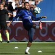 Neymar warming up for his first PSG start in four months