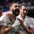 Karim Benzema fired Real Madrid to a late 3-2 win over La Liga's bottom club Huesca on Sunday
