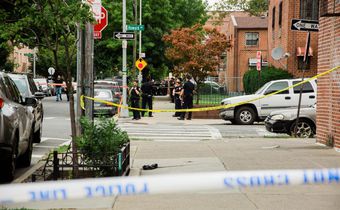 Masked Gunman Opens Fire on Police in Brooklyn Backyard