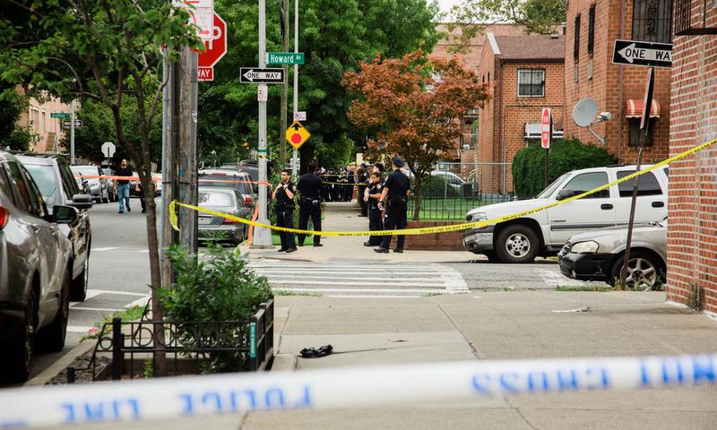 Masked Gunman Opens Fire on Police in Brooklyn Backyard