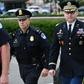 Lieutenant Colonel Alexander Vindman (R), a White House National Security Council Ukraine expert, arrives at Congress to testify in the impeachment inquiry against President Donald Trump