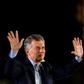 Argentina's President Mauricio Macri waves at supporters during the closing rally of his campaign in Cordoba, Argentina on October 24