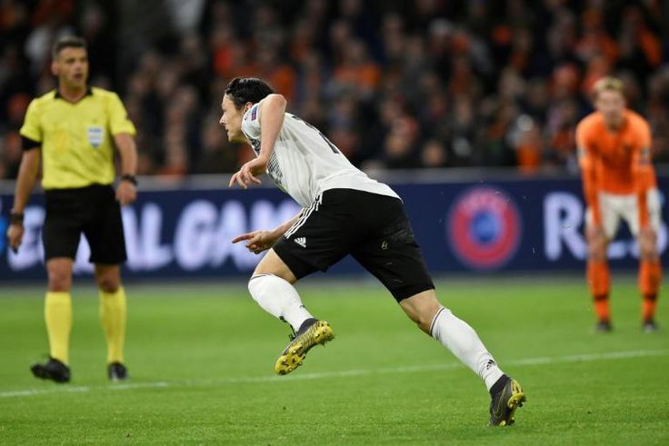 Nico Schulz spins away after scoring Germany's winner