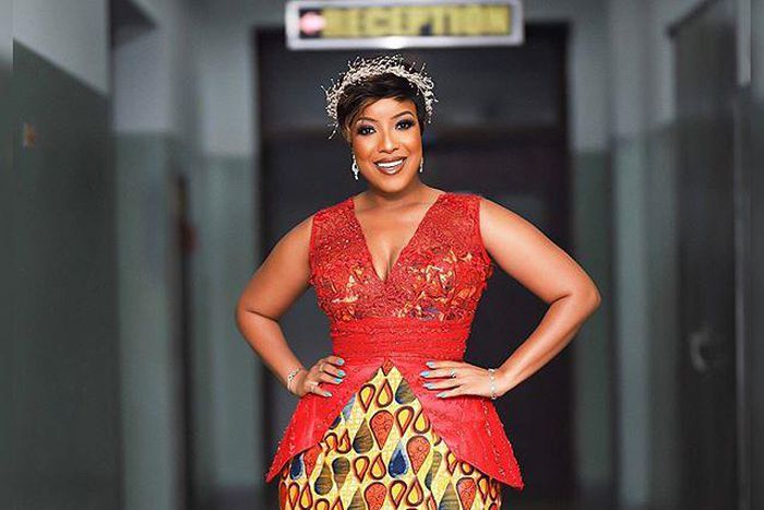 Ghanaian actress, Joselyn Dumas looking stunning in a beautiful dress and hair piece.