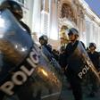 Riot police move into position around the Congress building in Lima after President Martin Vizcarra announced he was dissolving the opposition-dominated legislature