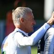 France's head coach Didier Deschamps shares a laugh with forward Antoine Griezmann in training ahead of the Euro 2020 qualifiers