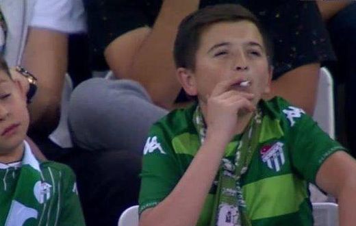 ‘Little boy’ captured smoking at a football stadium turns out to be a 36-year-old man (video)