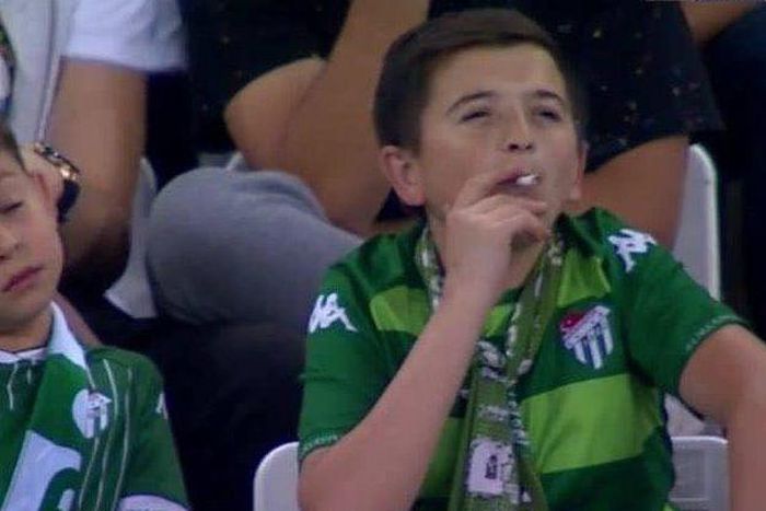 ‘Little boy’ captured smoking at a football stadium turns out to be a 36-year-old man (video)