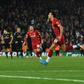 Liverpool's Curtis Jones celebrates after scoring the winning penalty against Arsenal