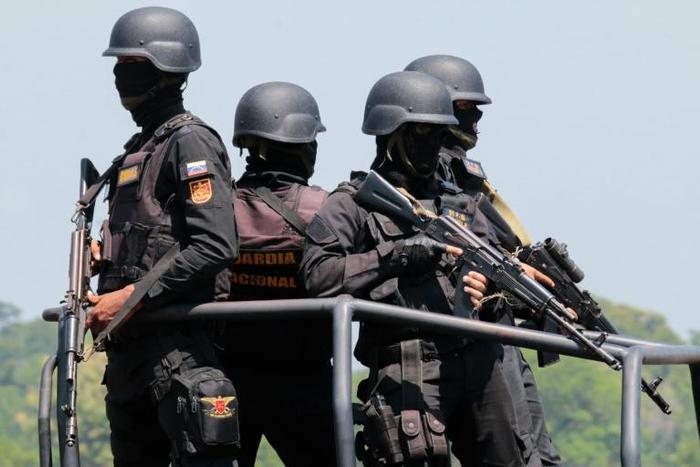 Members of Venezuela's armed forces take part in a military exercise at Garcia Hevia airport in La Fria, Tachira state