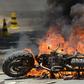 A motorbike burns in Cochabamba, a stronghold of Bolivia President Evo Morales, as clashes between his supporters and those of rival Carlos Mesa continue