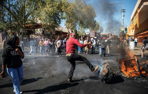 Angry protesters looted alleged foreign-owned shops in Johannesburg in a new wave of violence