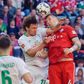 Bremen defender Milos Veljkovic (L) was sent off before Niklas Suele (R) sealed a late win for Bayern Munich on Saturday