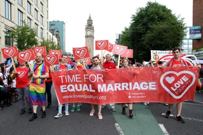 Same-sex marriage and abortion laws in Northern Ireland were liberalised in a landmark shift for the province aimed at bringing it into line with mainland Britain