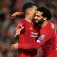 Mo Salah celebrates with Roberto Firmino after scoring in Liverpool's Champions League win over Salzburg on Wednesday